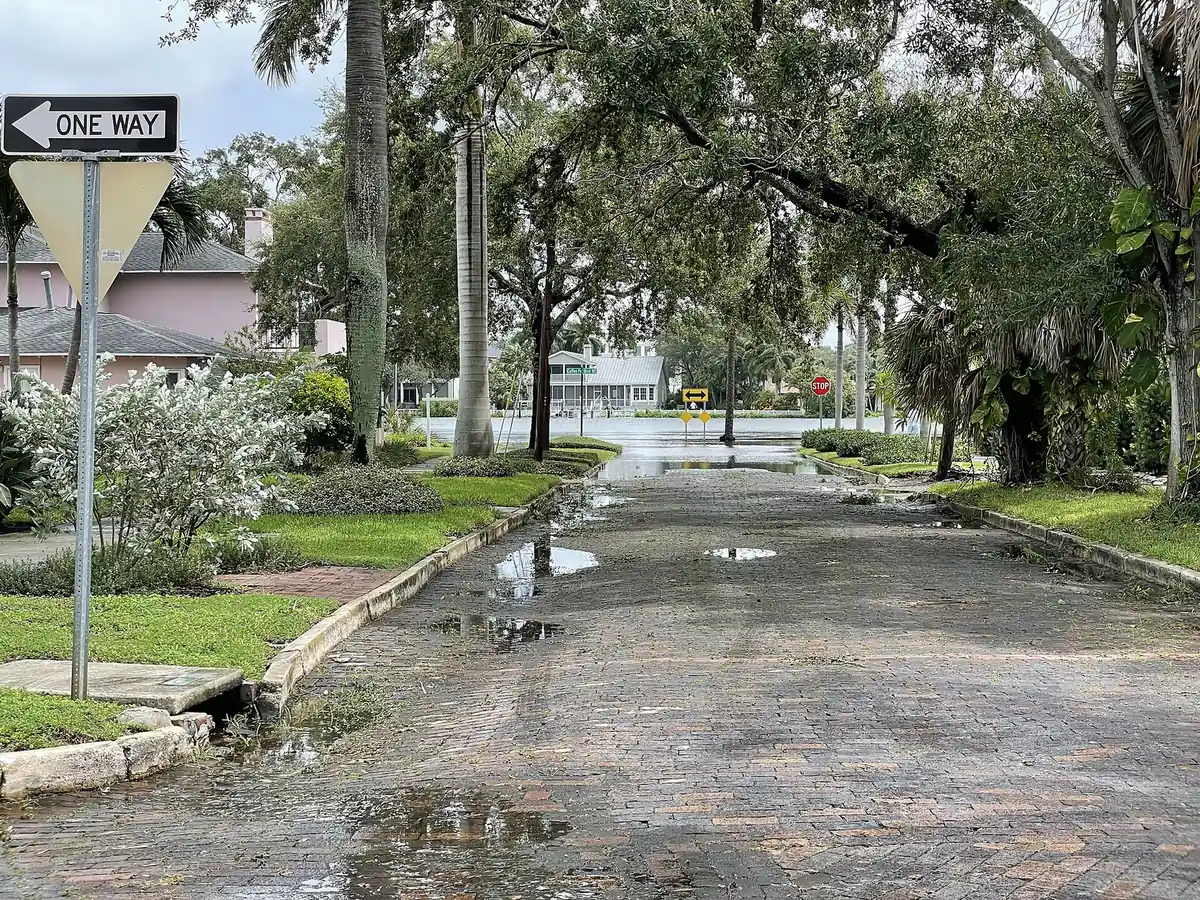 Storm surge from Hurricane Idalia covers a brick street near Coffee Pot Boulevard in St. Petersburg.