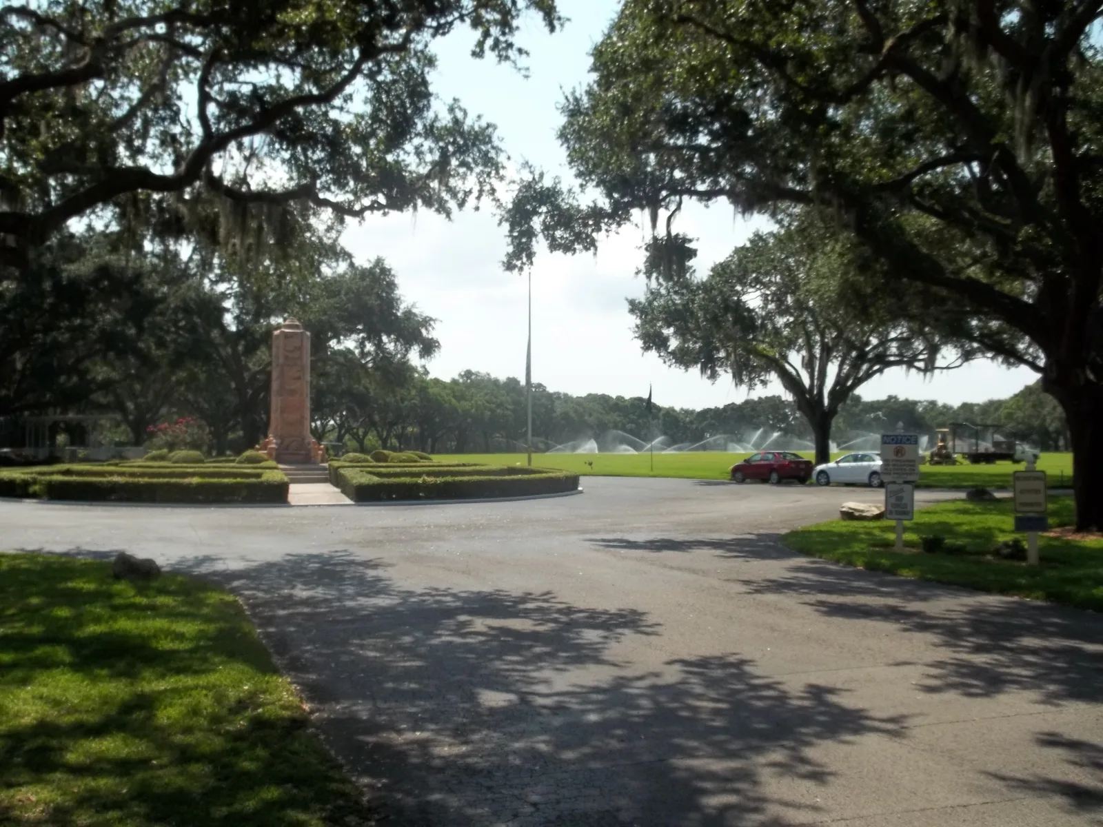 The monument circle under live oaks at the entrance to Bay Pines National Cemetery, just west of St. Petersburg.