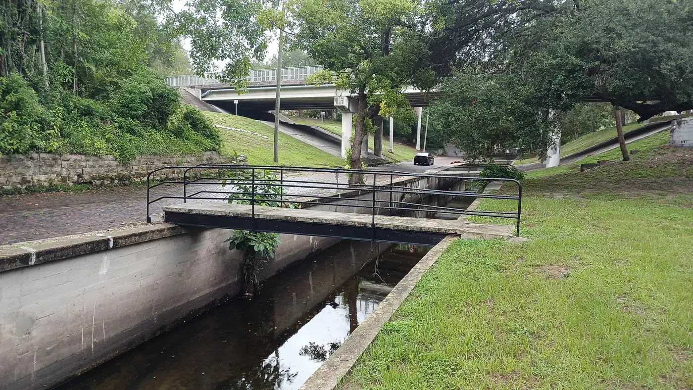 A footbridge over the Booker Creek canal in the Roser Park Historic District, St. Petersburg.