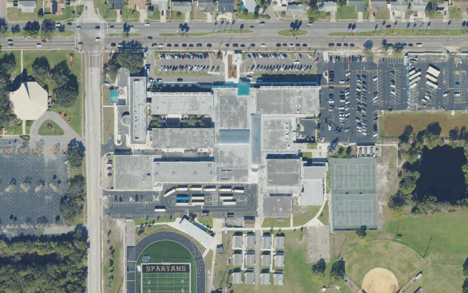 Lakewood High School's campus on 54th Avenue South in St. Petersburg seen from the air, with the Spartans' football field at the bottom.