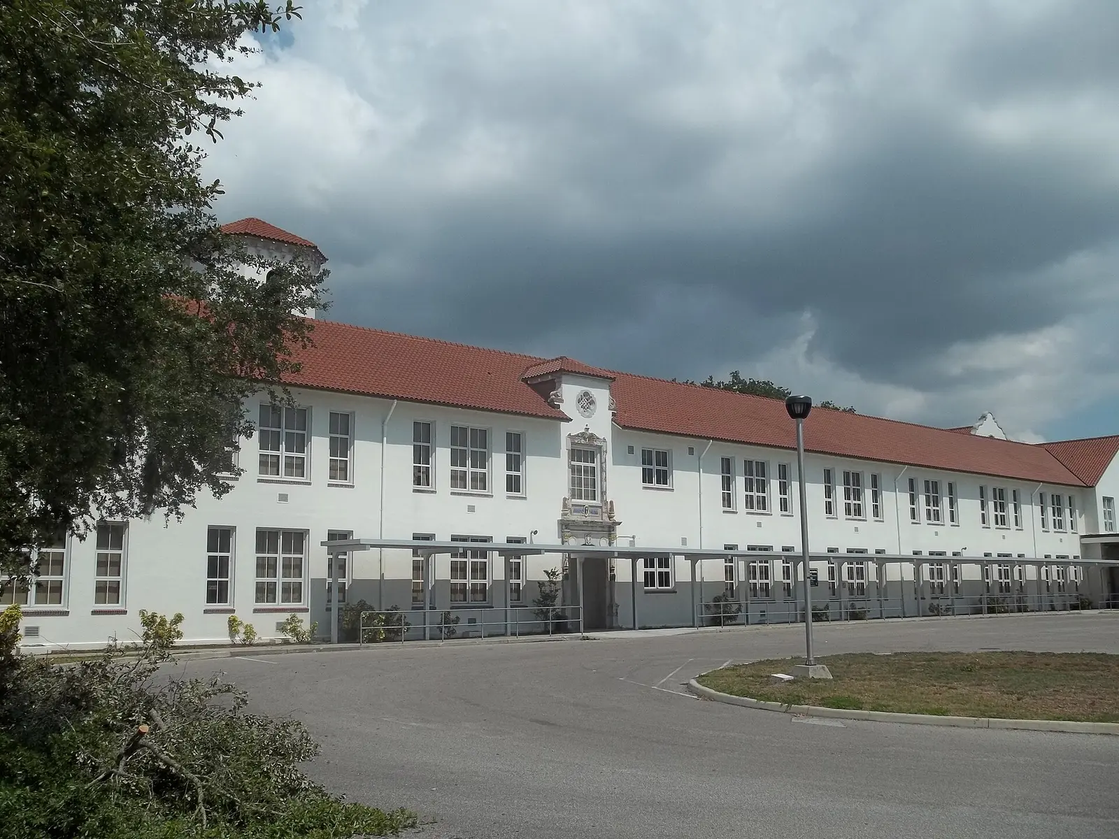 The tile-roofed main building of St. Petersburg High School on Fifth Avenue North, in the Kenwood Historic District.
