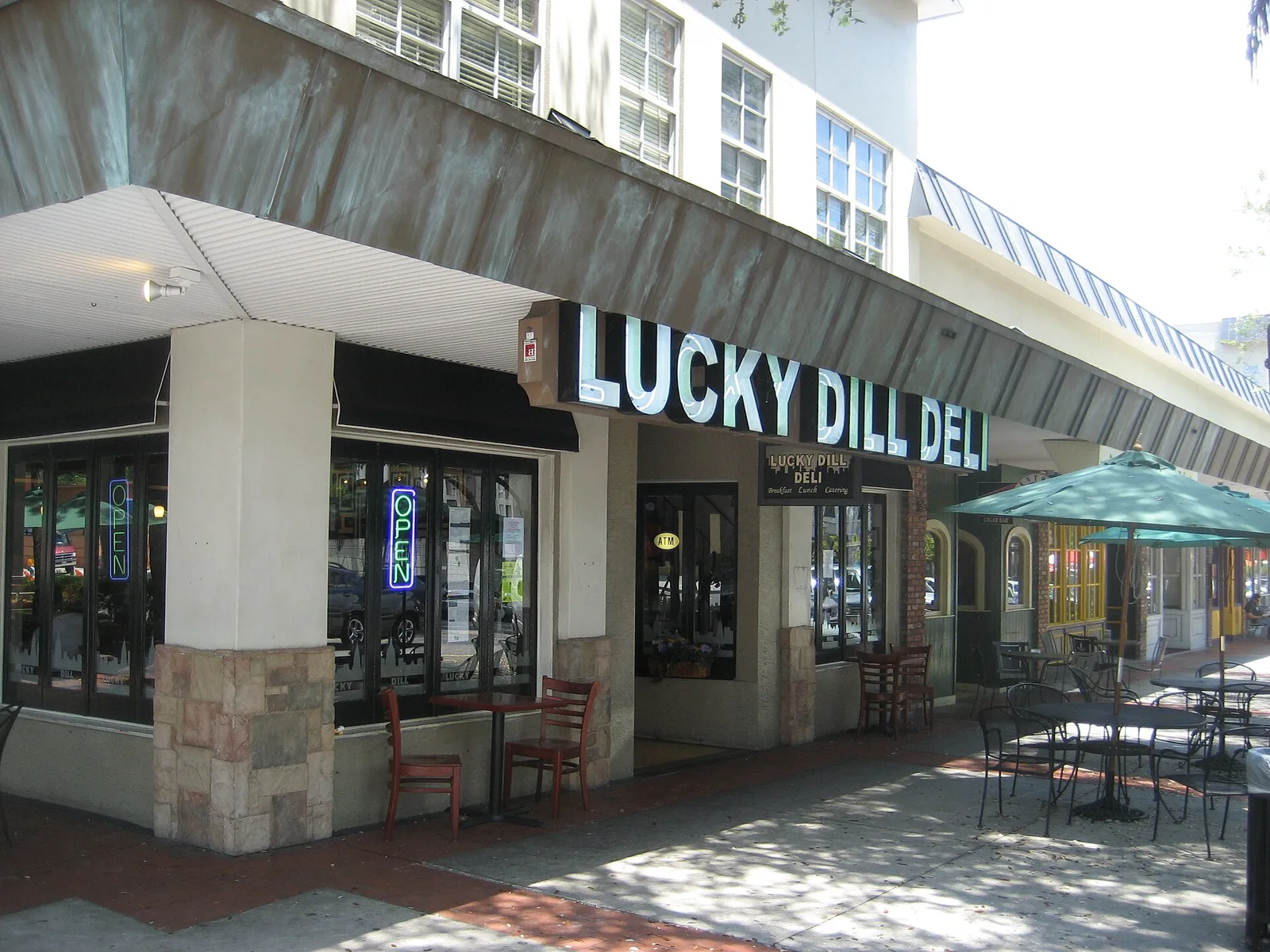 Sidewalk tables outside a deli on Central Avenue in downtown St. Petersburg, photographed in 2008.
