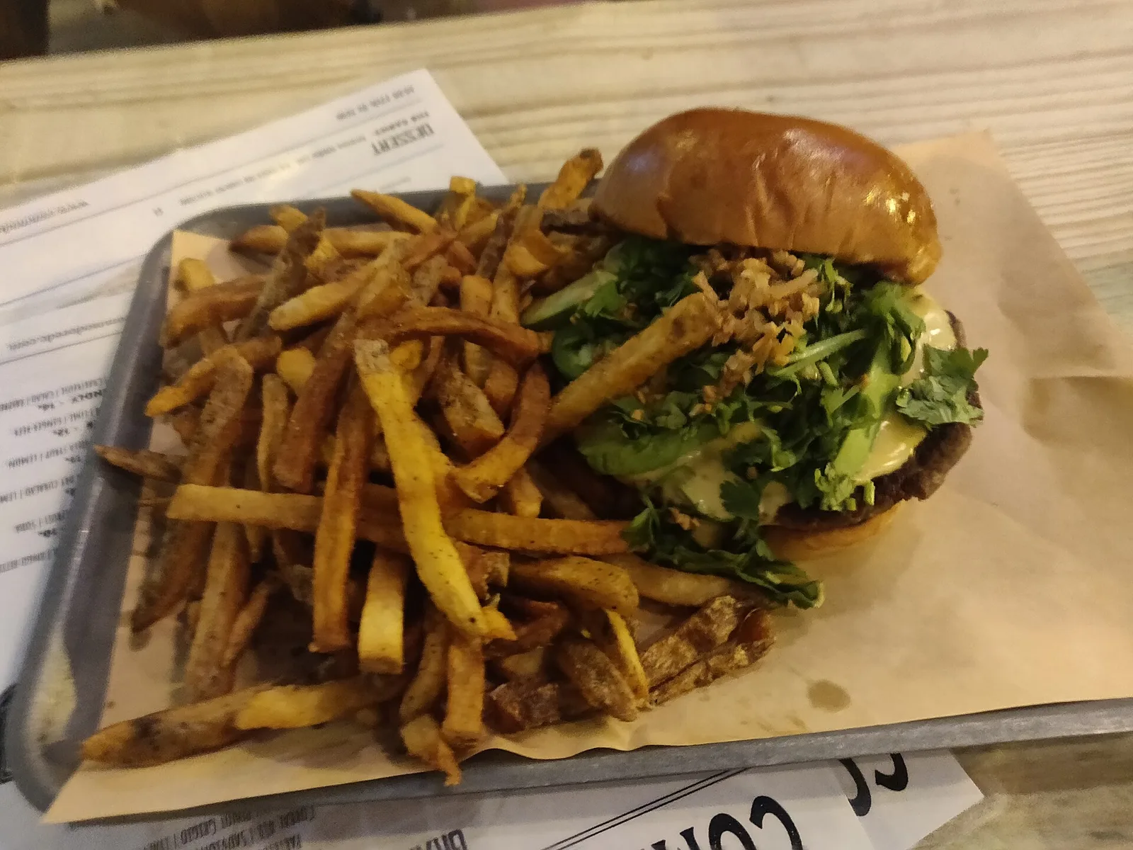 A cheeseburger and fries. The photo is a stock food picture, not one taken at a place on this list.